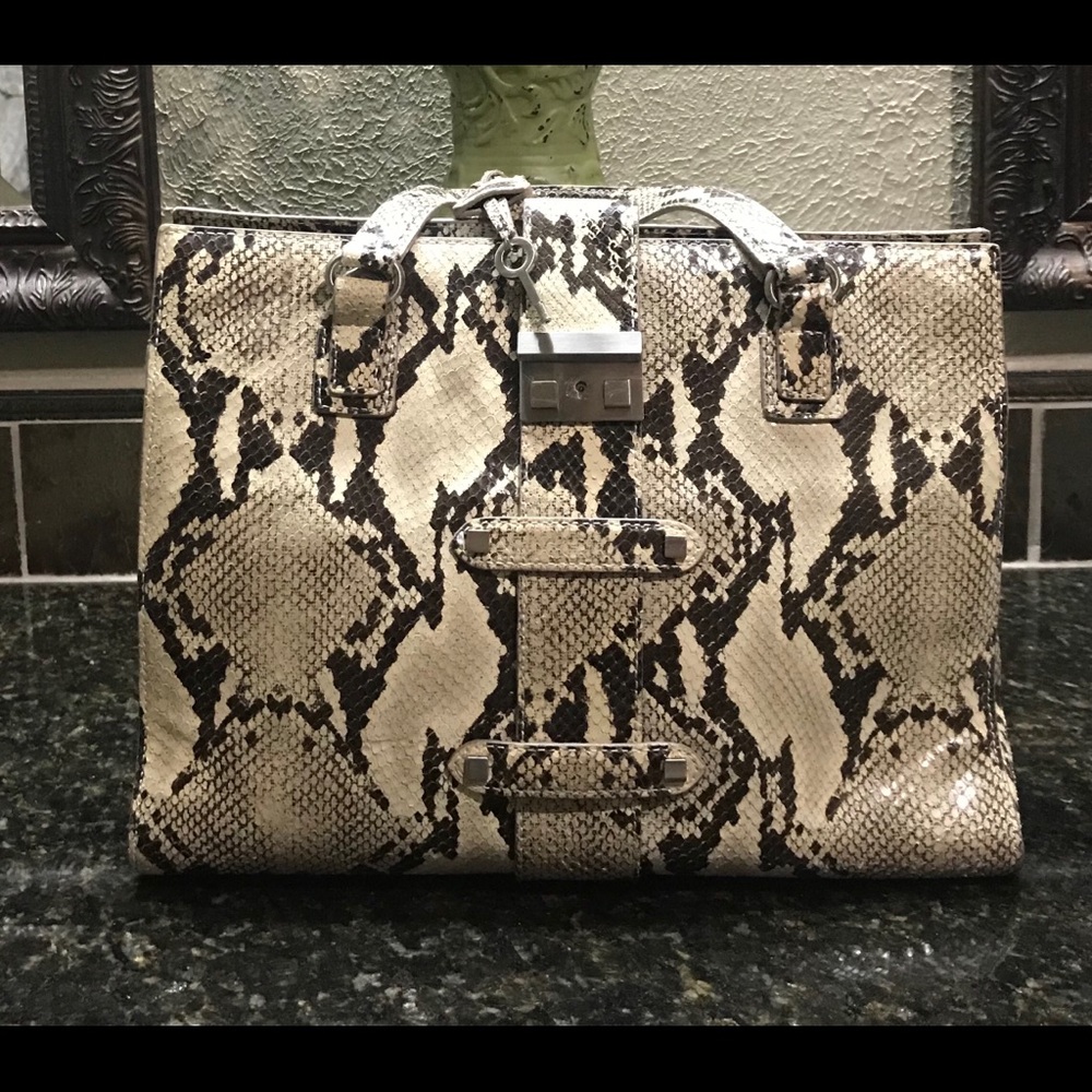 Donald Pliner snake print purse.